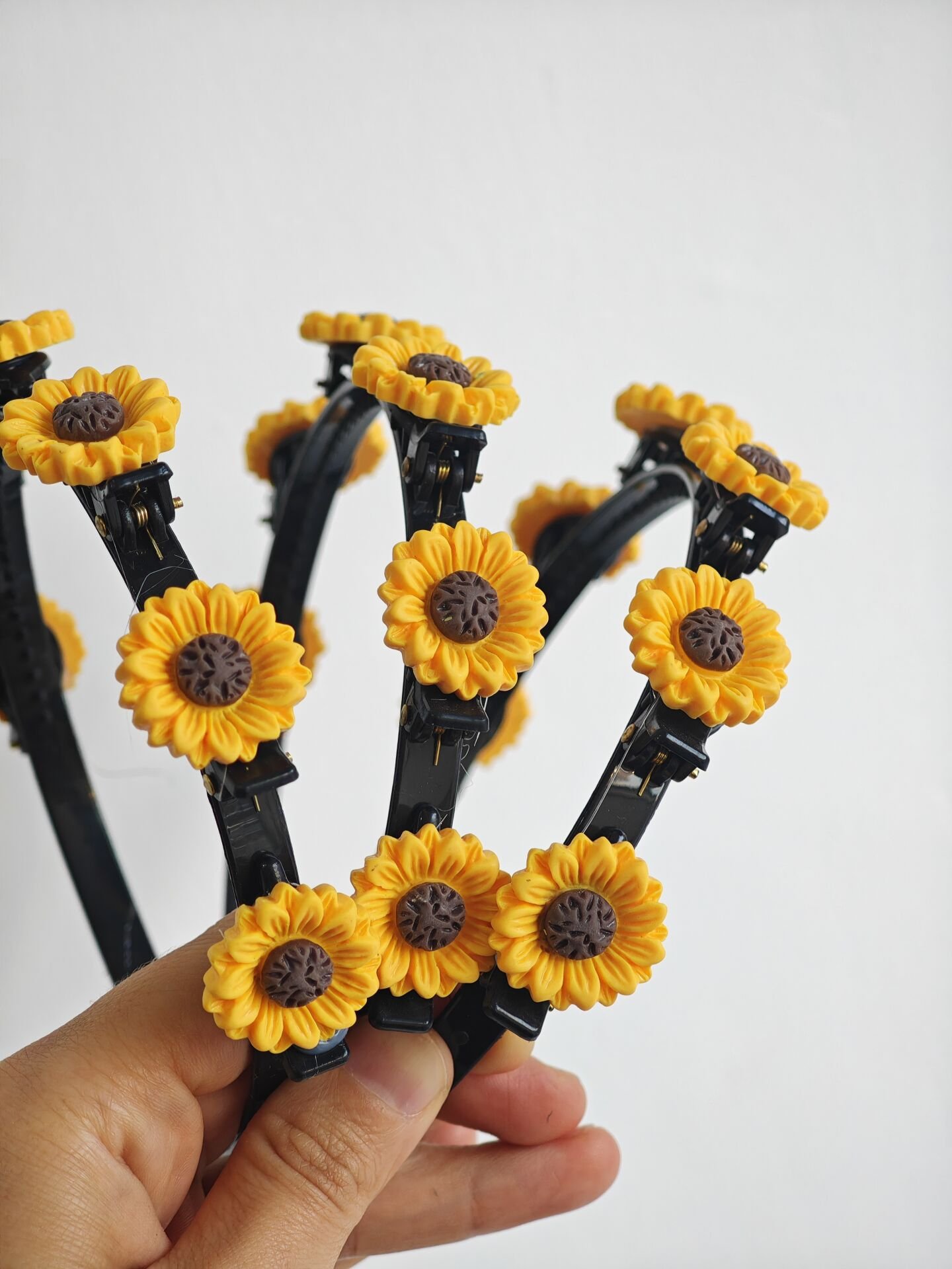 AYÇİÇEĞİ MODEL PENS MANDALLI SAÇ BÜKÜCÜ TAÇ